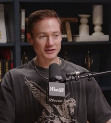 Photo shows longevity influencer Bryan Johnson speaking to Jay Shetty on his podcast, On Purpose
