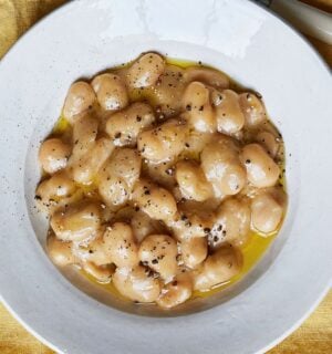 a bowl of cacio e pepe-style butterbeans