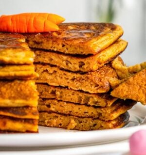 a stack of carrot cake pancakes with cinnamon and ginger