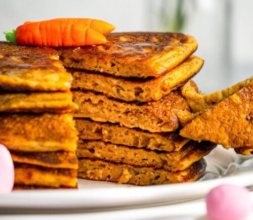 a stack of carrot cake pancakes with cinnamon and ginger