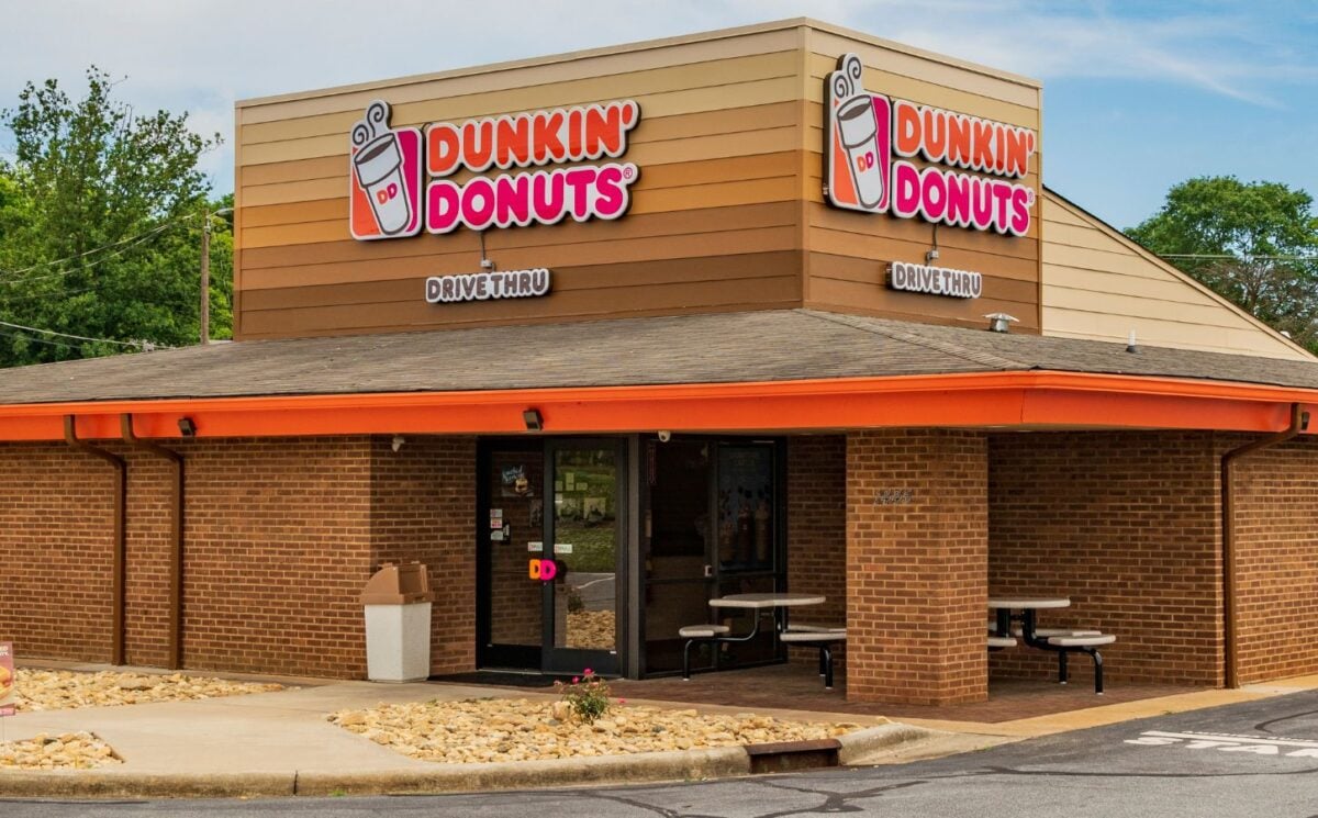 Photo shows a Dunkin' drive-through