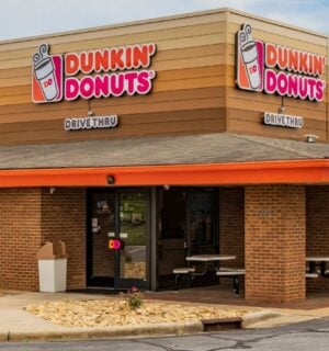 Photo shows a Dunkin' drive-through