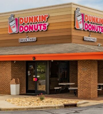 Photo shows a Dunkin' drive-through