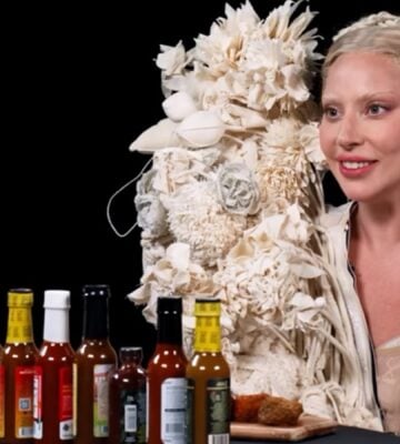 Photo shows Lady Gaga appearing on the YouTube show Hot Ones, where she ate vegan chicken wings