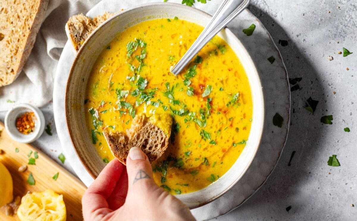 A large bowl of lemon chickpea soup from Romy London