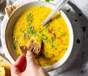 A large bowl of lemon chickpea soup from Romy London