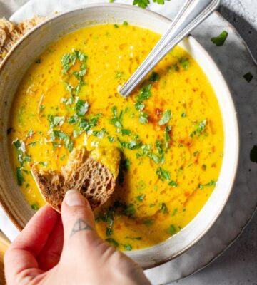 A large bowl of lemon chickpea soup from Romy London