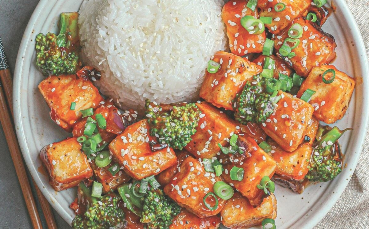 a plate of rice and spicy sweet & sour tofu broccoli stir fry
for spicy vegan dinner recipes