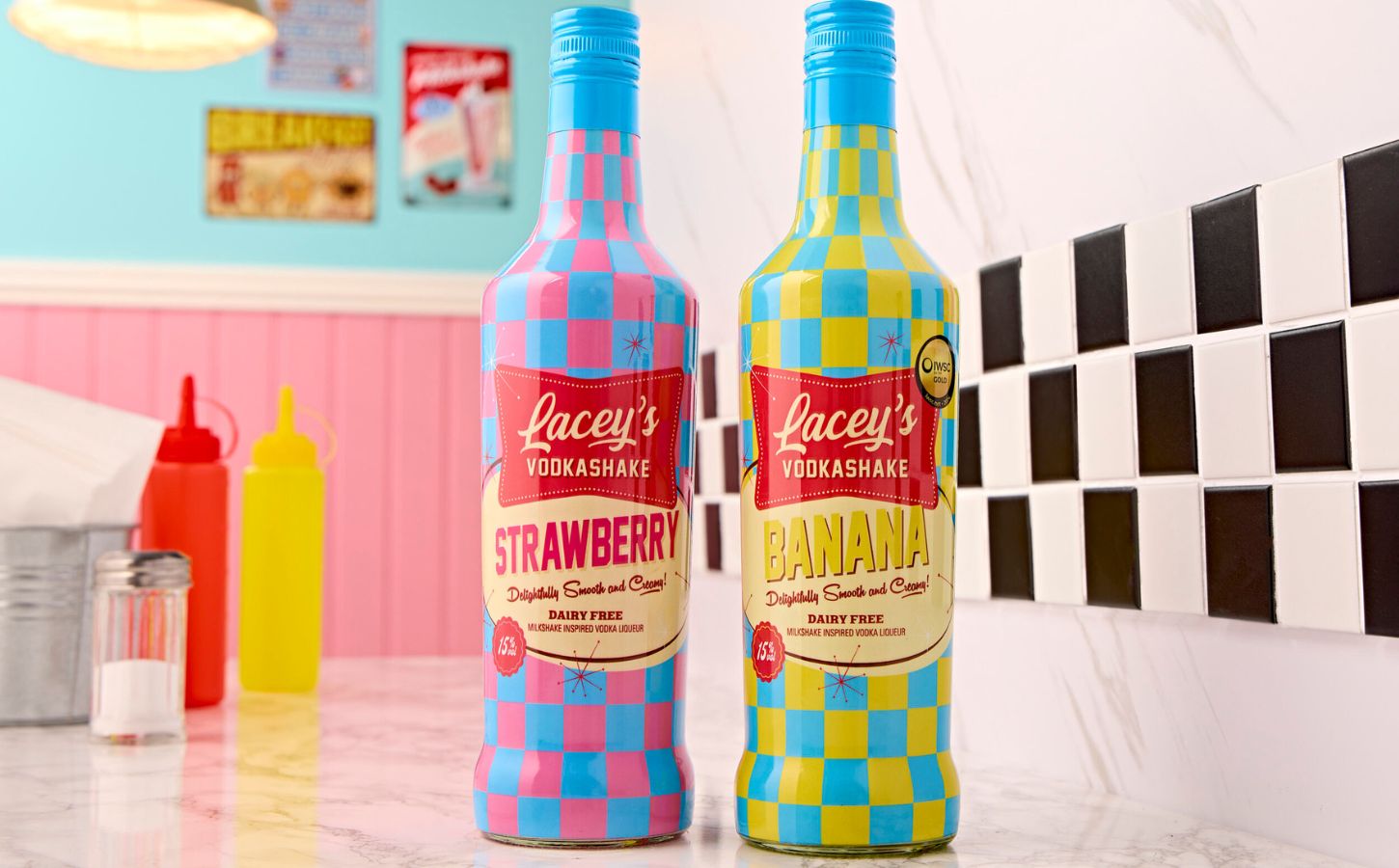 Photo shows the two flavors of Lacey's Vodkashakes - strawberry and banana - on a countertop in an 1950s-style American diner