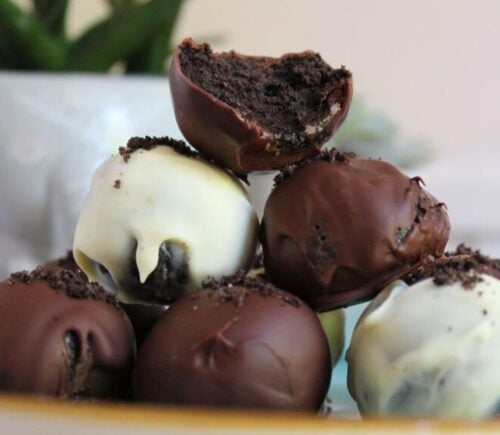 A pile of dark and white 3-ingredient vegan Oreo balls