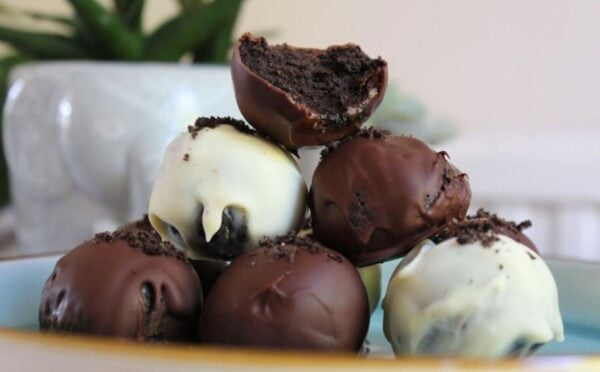 A pile of dark and white 3-ingredient vegan Oreo balls