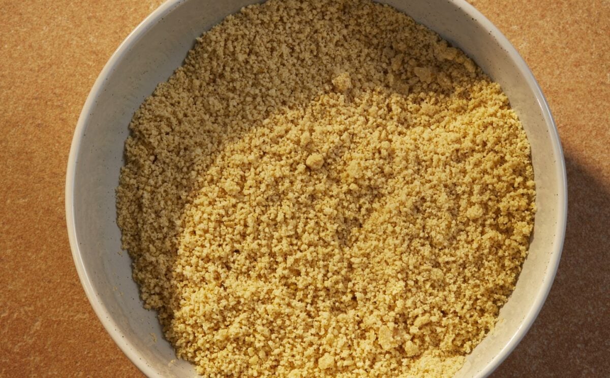 a bowl of vegan parmesan that is dairy-free and made of nuts