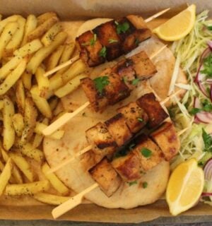 Vegan souvlakia made with fries and tofu