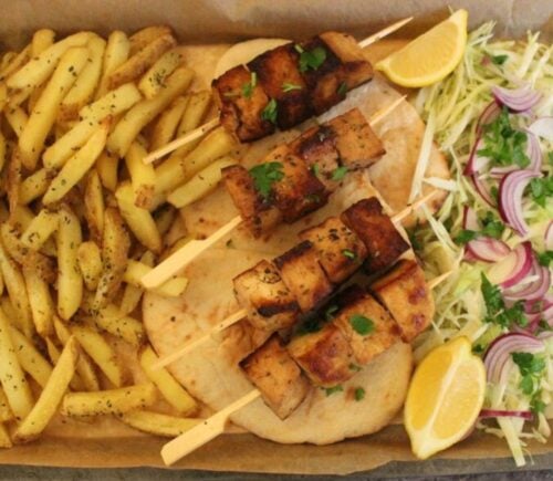 Vegan souvlakia made with fries and tofu