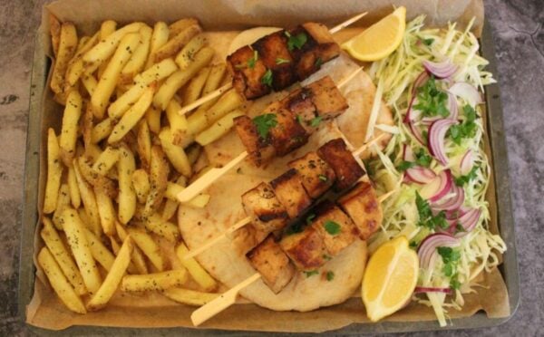 Vegan souvlakia made with fries and tofu