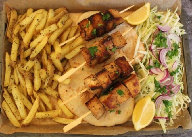 Vegan souvlakia made with fries and tofu