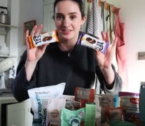 A still of a recent video from Madeleine Olivia showing her vegan weekly food shop ideas and inspiration