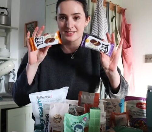 A still of a recent video from Madeleine Olivia showing her vegan weekly food shop ideas and inspiration