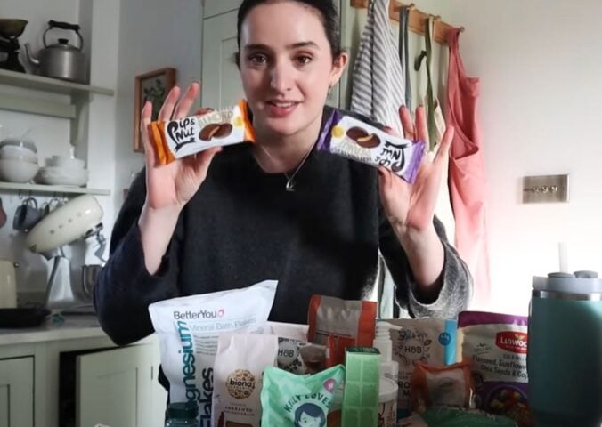 A still of a recent video from Madeleine Olivia showing her vegan weekly food shop ideas and inspiration