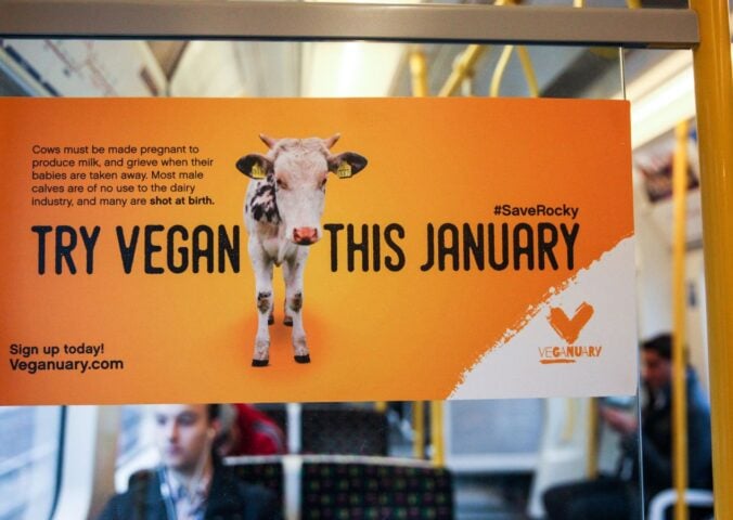 A poster for Veganuary on a London Underground train