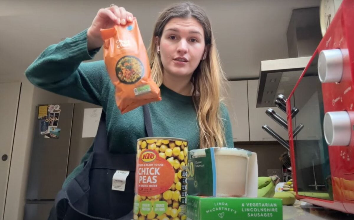 A still of Nicole Whittle, also known as Vegan Beauty Girl, holding up vegan ingredients that were available in 2007