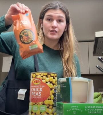 A still of Nicole Whittle, also known as Vegan Beauty Girl, holding up vegan ingredients that were available in 2007