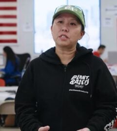 Photo shows Samantha Lau, a campaigner for Plant Based Treaty, talking about the group's collaboration with American Red Cross