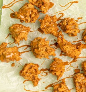 apple pie nuggets drizzled with icing and served with biscoff and ice cream