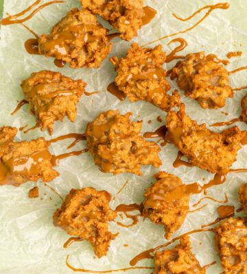 apple pie nuggets drizzled with icing and served with biscoff and ice cream