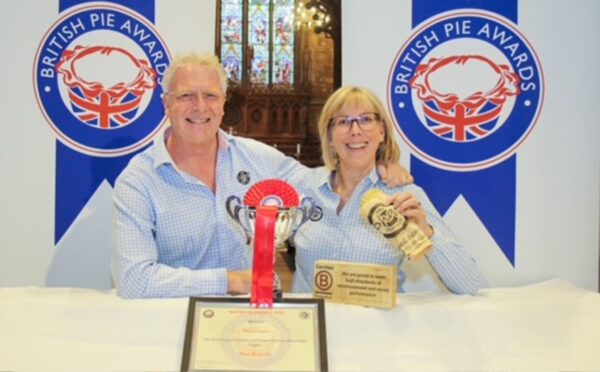 The founders of the Phat Pasty Company receiving their "Pasty of the Year" award for their vegan pasty
