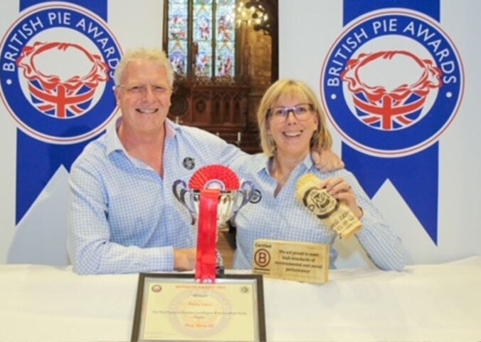 The founders of the Phat Pasty Company receiving their "Pasty of the Year" award for their vegan pasty