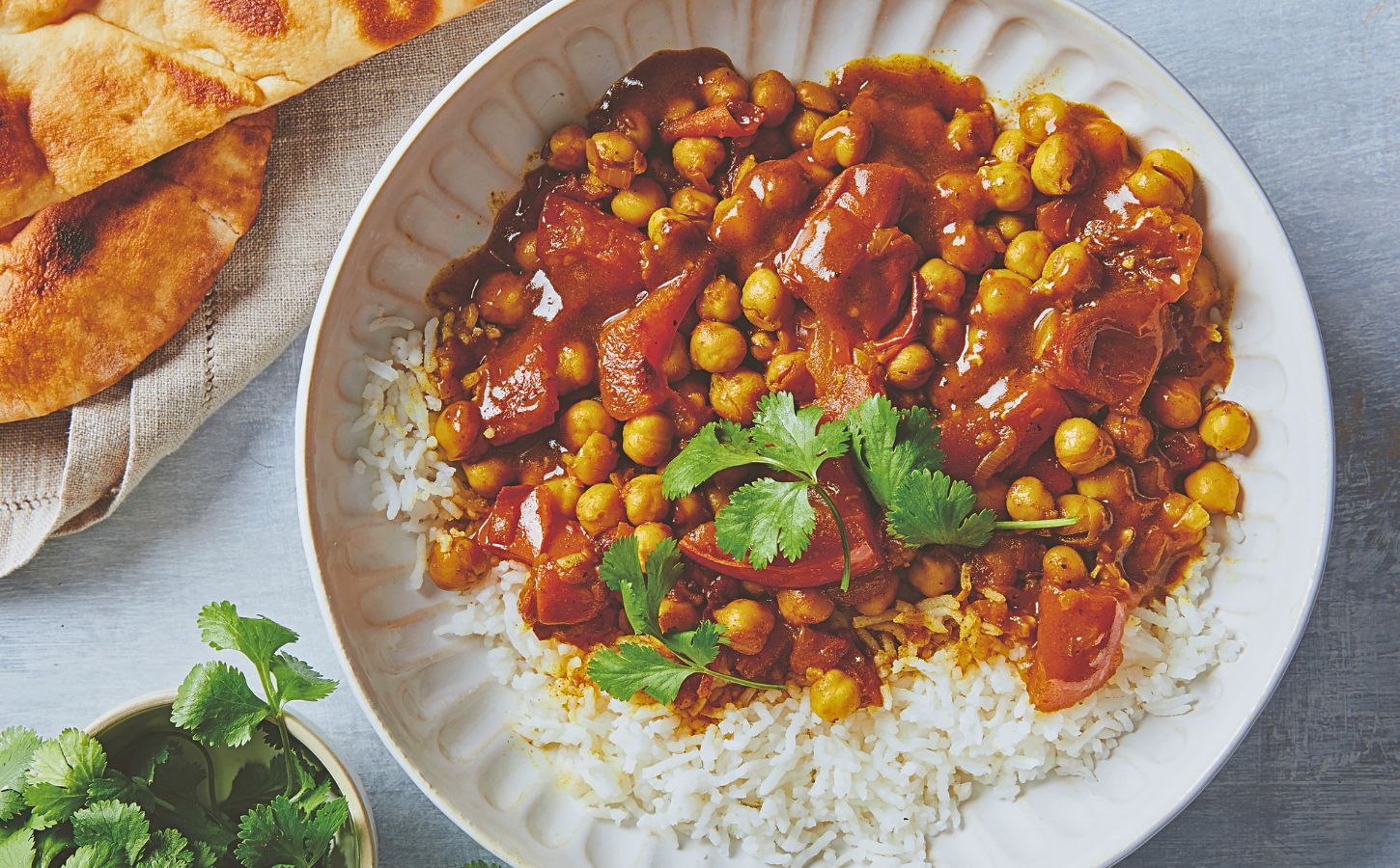 a bowl of chickpea stew or chana masala a vegan dinner