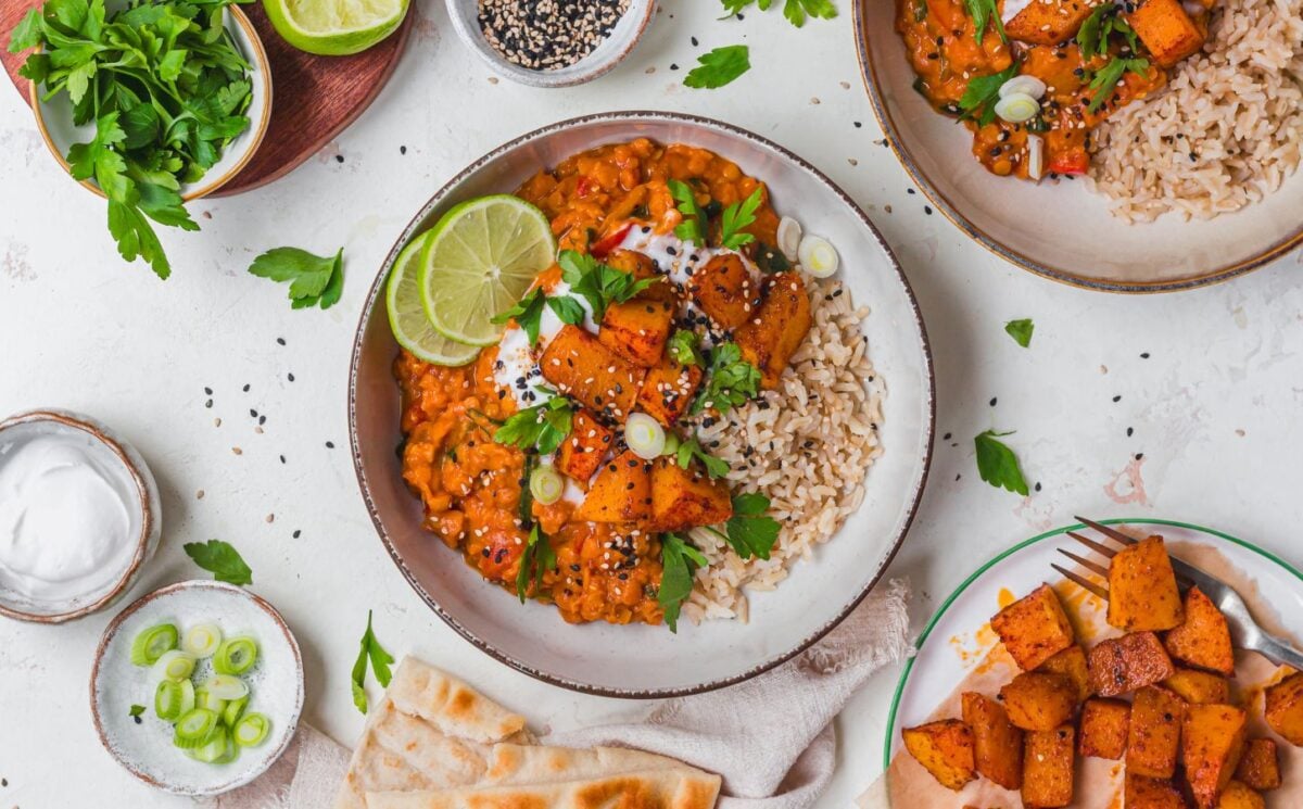 a bowl of creamy roasted butternut squash and spinach dahl