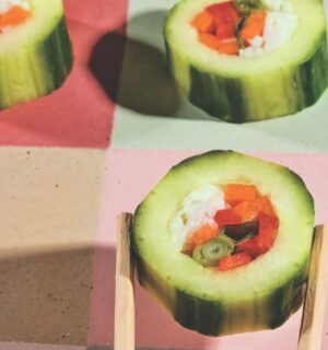 cucumber bites with avocado, bell pepper, carrot, and green onion