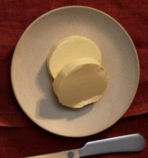 A plate containing dairy-free butter made to a vegan recipe