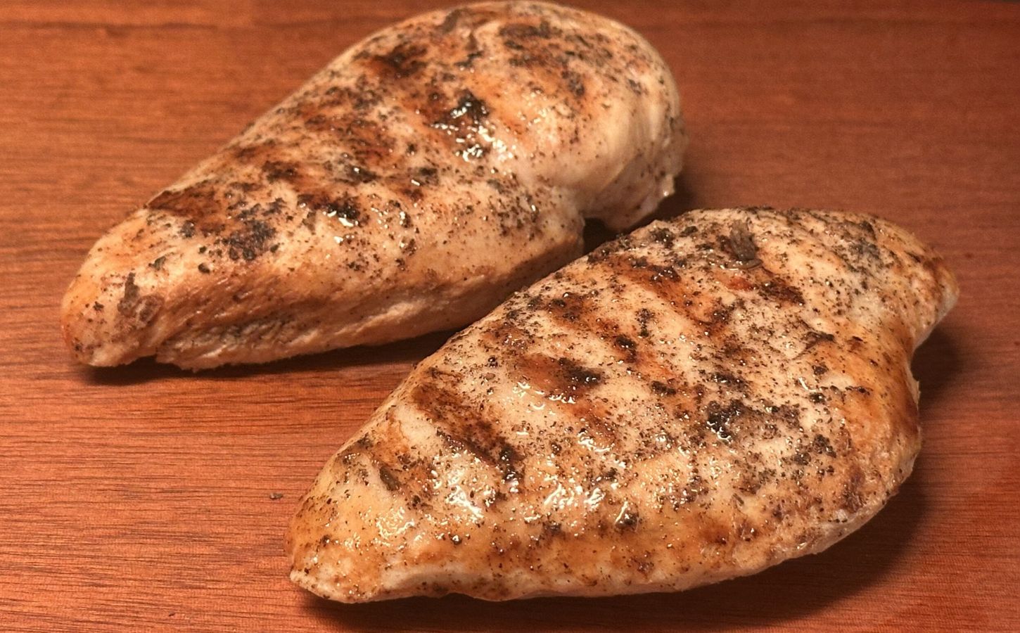 Conventional and plant-based chicken breast side by side