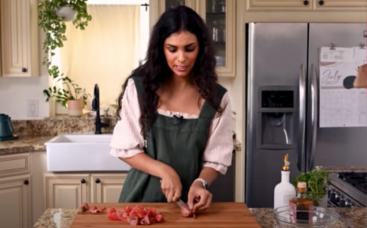 Nisha Vora preparing her favorite easy vegan recipe in her kitchen