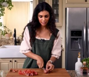 Nisha Vora preparing her favorite easy vegan recipe in her kitchen