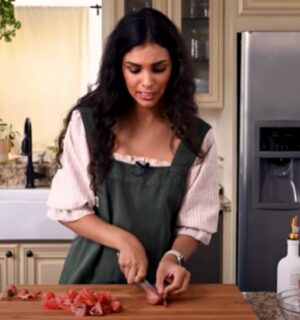 Nisha Vora preparing her favorite easy vegan recipe in her kitchen