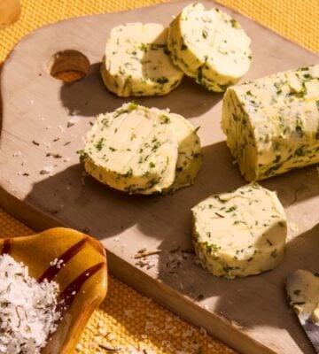 a vegan herb butter with lemon zest and herbs like dill, chives, parsley