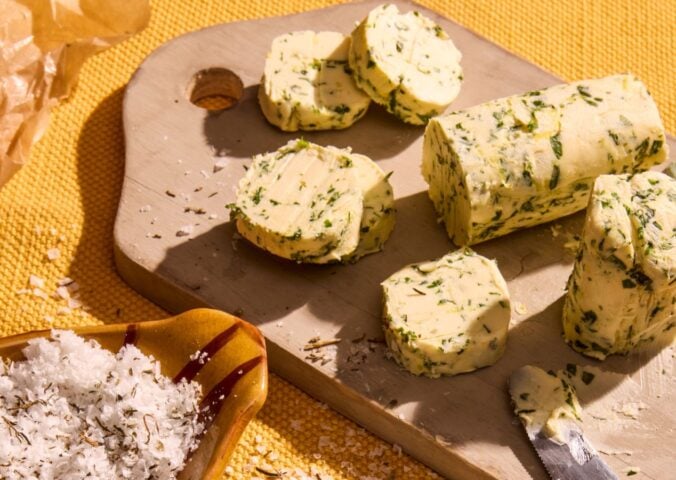 a vegan herb butter with lemon zest and herbs like dill, chives, parsley