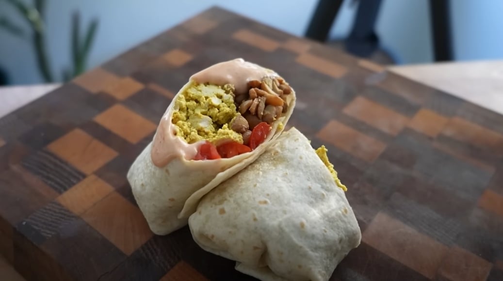 A scrambled tofu wrap, a high protein vegan breakfast