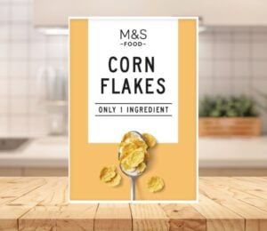 A packet of one-ingredient Marks and Spencer corn flakes on a kitchen counter