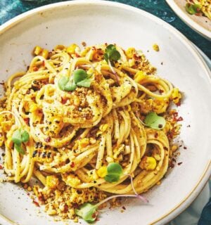 a bowl of miso creamy corn pasta with nutritional yeast