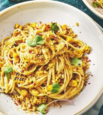 a bowl of miso creamy corn pasta with nutritional yeast