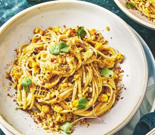 a bowl of miso creamy corn pasta with nutritional yeast