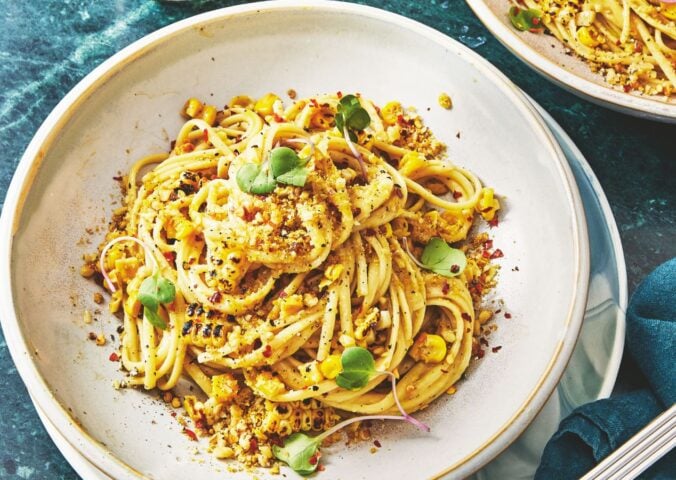 a bowl of miso creamy corn pasta with nutritional yeast