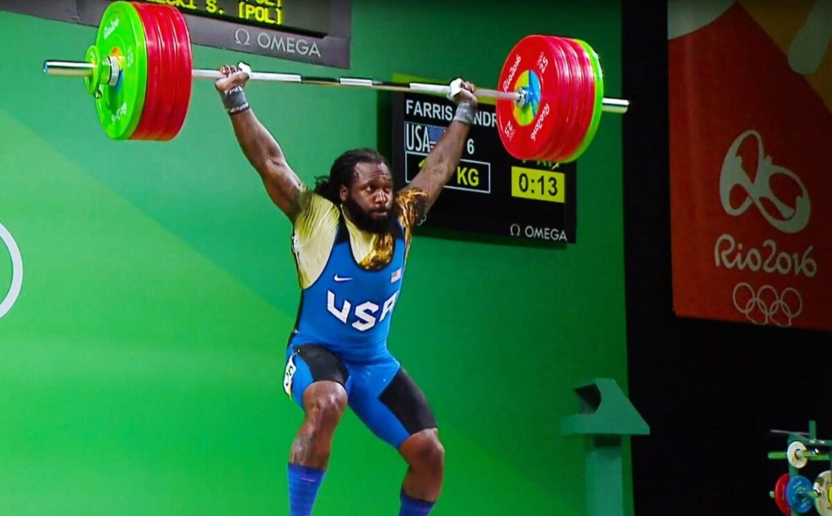 Photo shows American weightlifter and Olympian Kendrick J. Farris competing