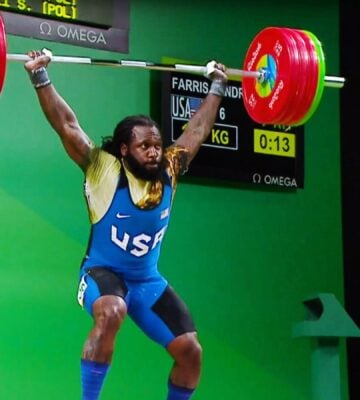 Photo shows American weightlifter and Olympian Kendrick J. Farris competing