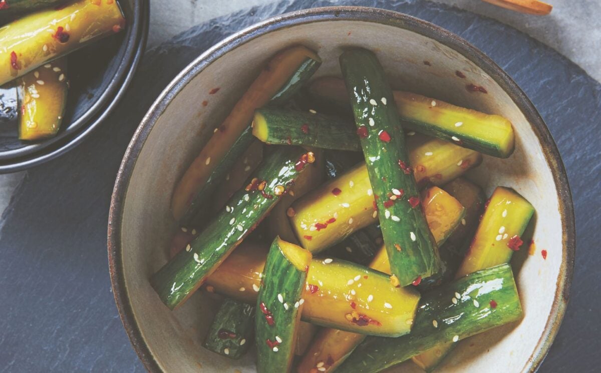 a bowl of pickled sesame cucumbers that are crunchy and light